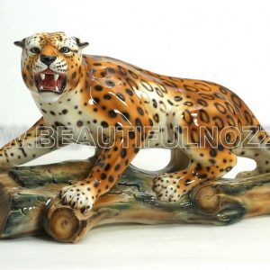 LEOPARDO SU TRONCO IN CERAMICA CON MACCHIE ANIMALI PANTERA LEONE ARREDO CASA