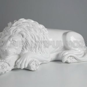 LEONE SU TRONCO IN CERAMICA BIANCO CON OCCHI IN CRISTALLO SWAROVSKI