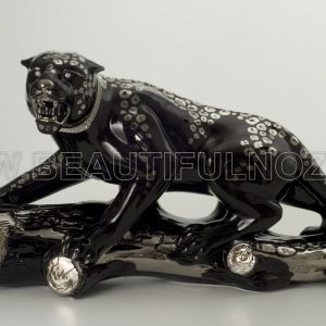 LEOPARDO SU TRONCO IN CERAMICA NERO PLATINO CON CRISTALLI SWAROVSKI ANIMALI